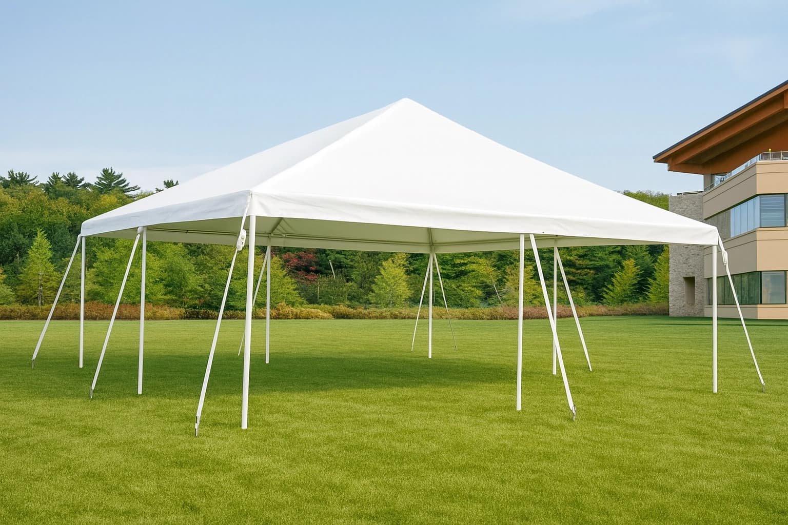 Outdoor front angle of the 20x20 event tent set with round tables, chairs, and open lawn.