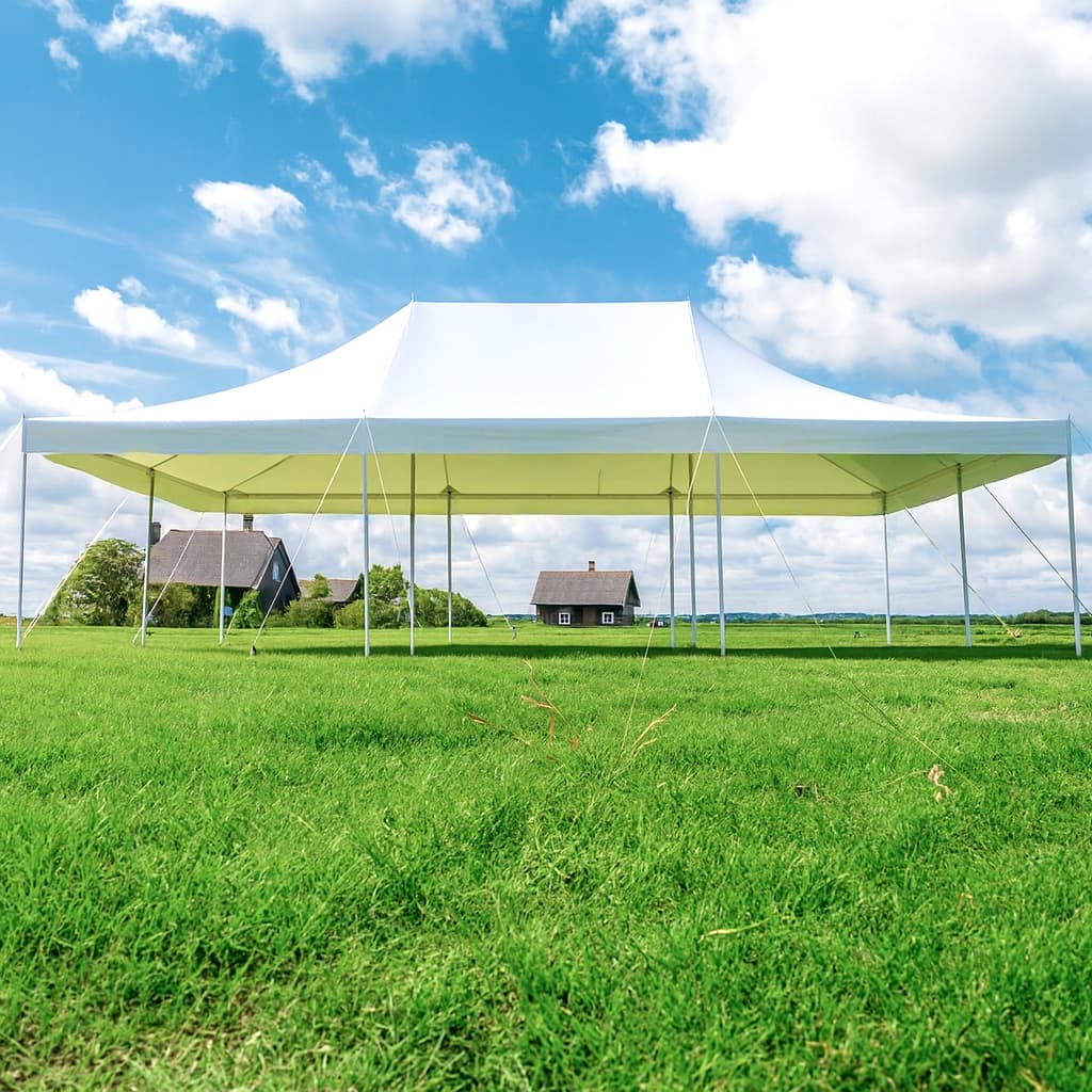 Under-canopy view of the 20x30 frame-style event tent showing open interior space and support poles.