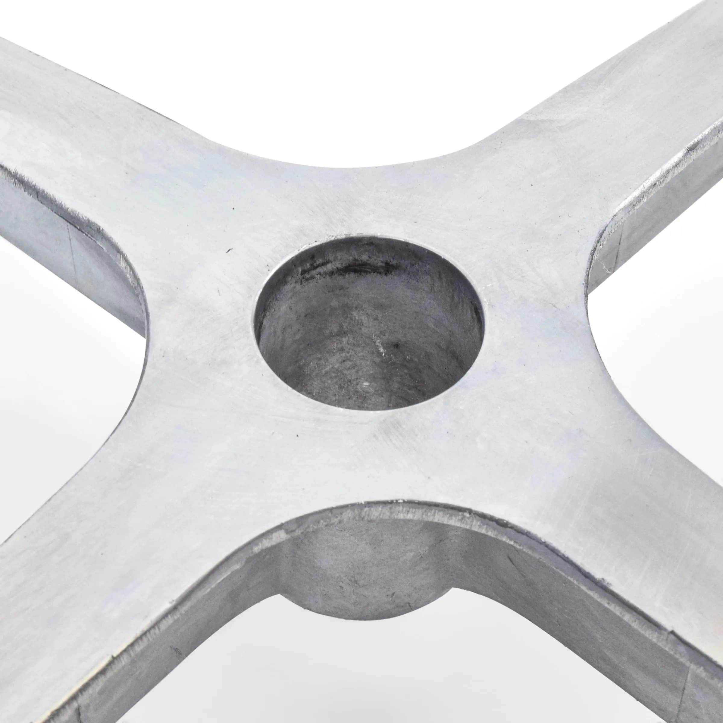 Close view of the rod connection hole in the base of the 24-inch cocktail table showing fitting mechanism.