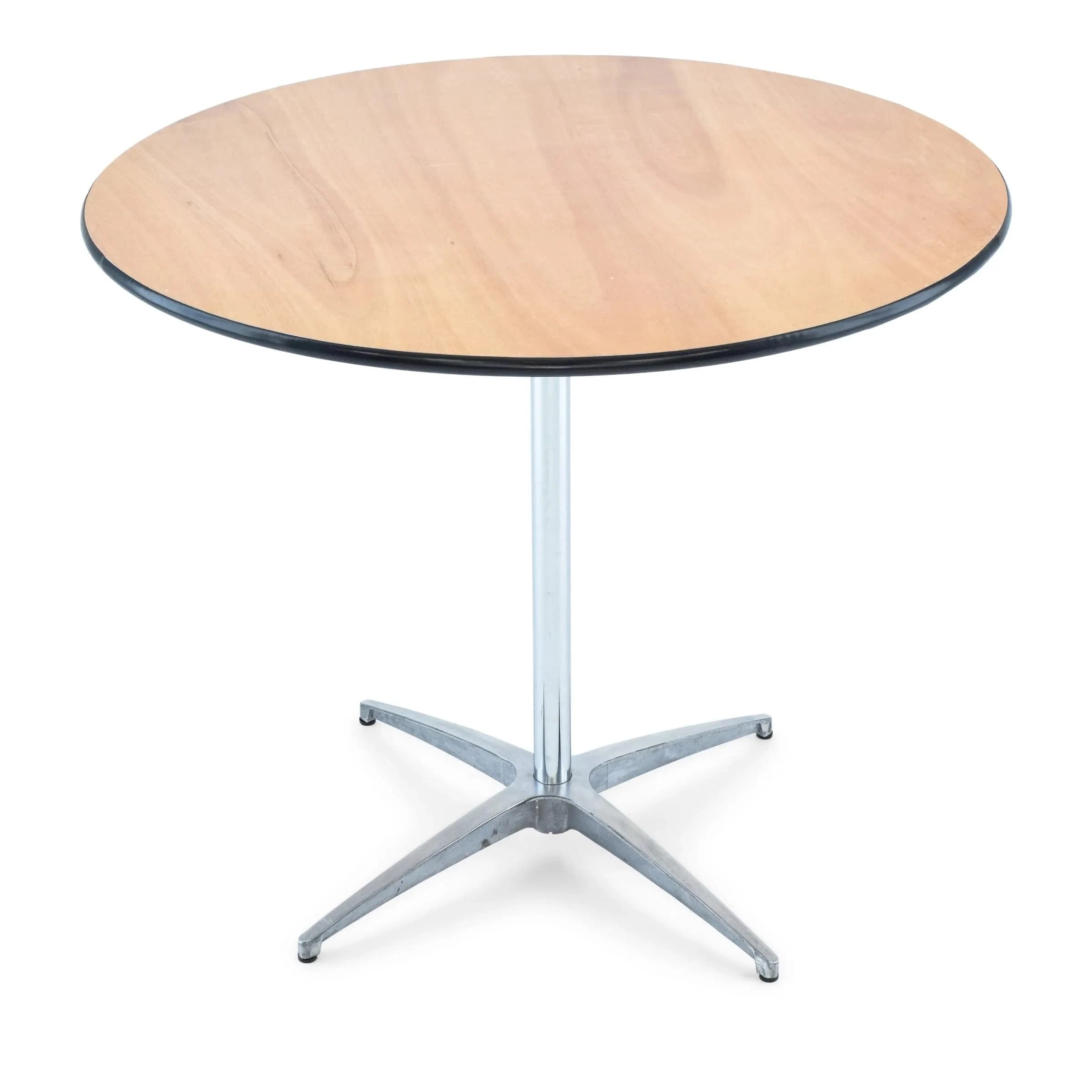 Side view of the 36-inch natural wood cocktail table showing shorter height configuration and tabletop detail.