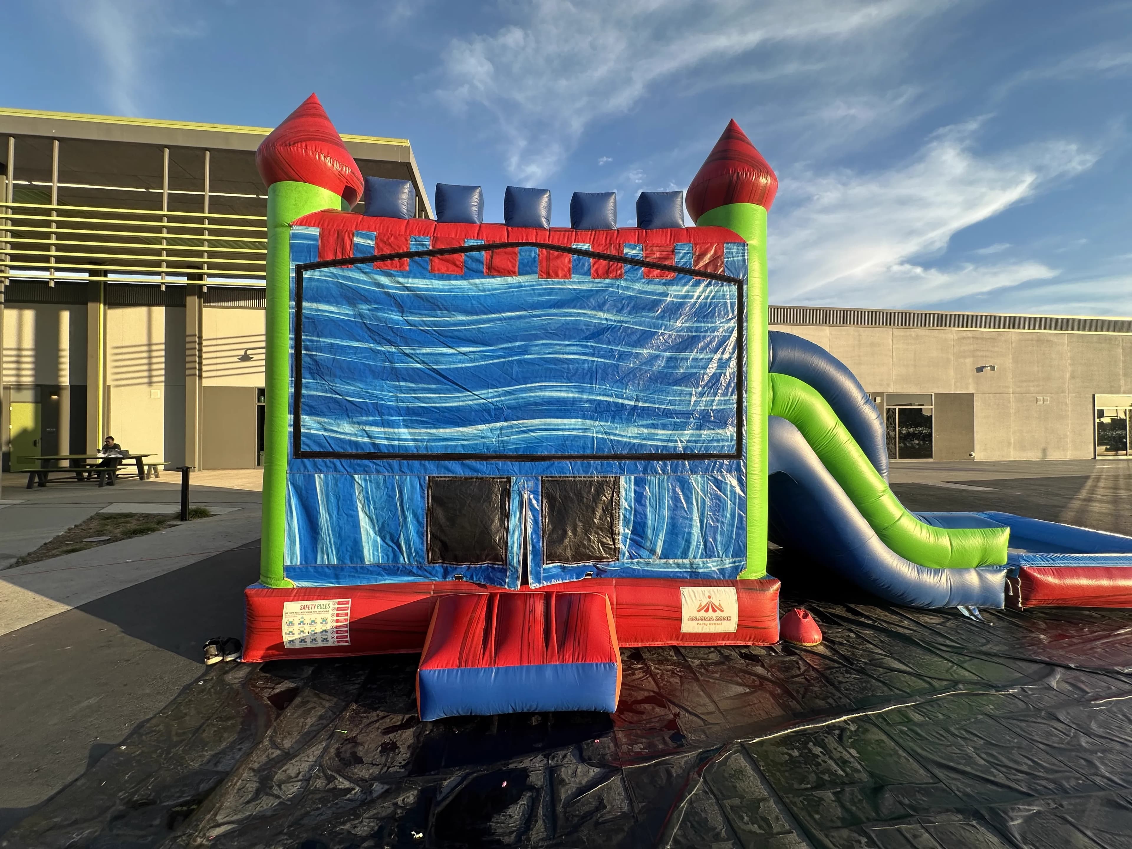 Side view of the 5 in 1 Ocean Wave Castle Combo.
