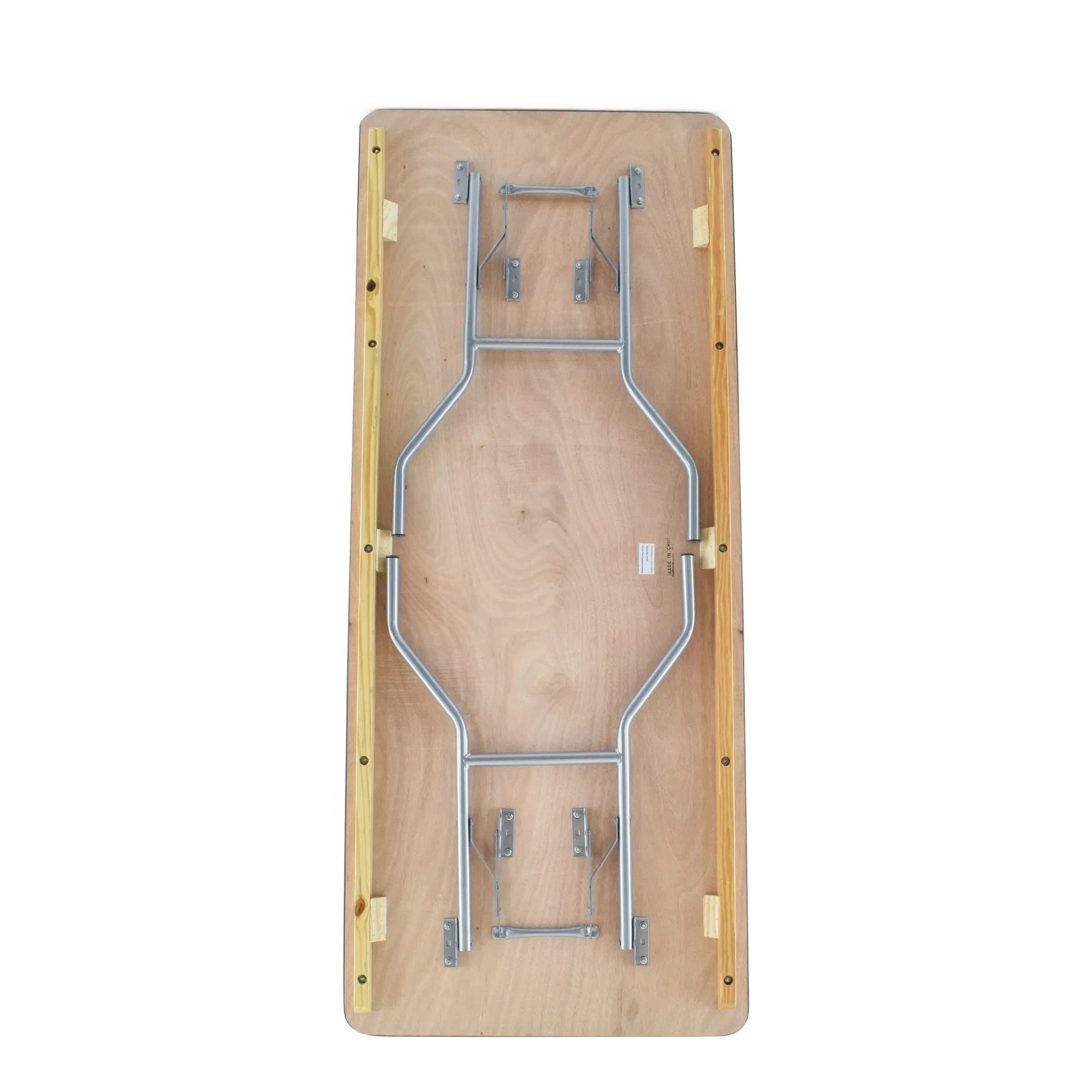 Underside view of the 6-Foot Natural Wood Vinyl-Edge Table showing the folded legs and steel support braces.