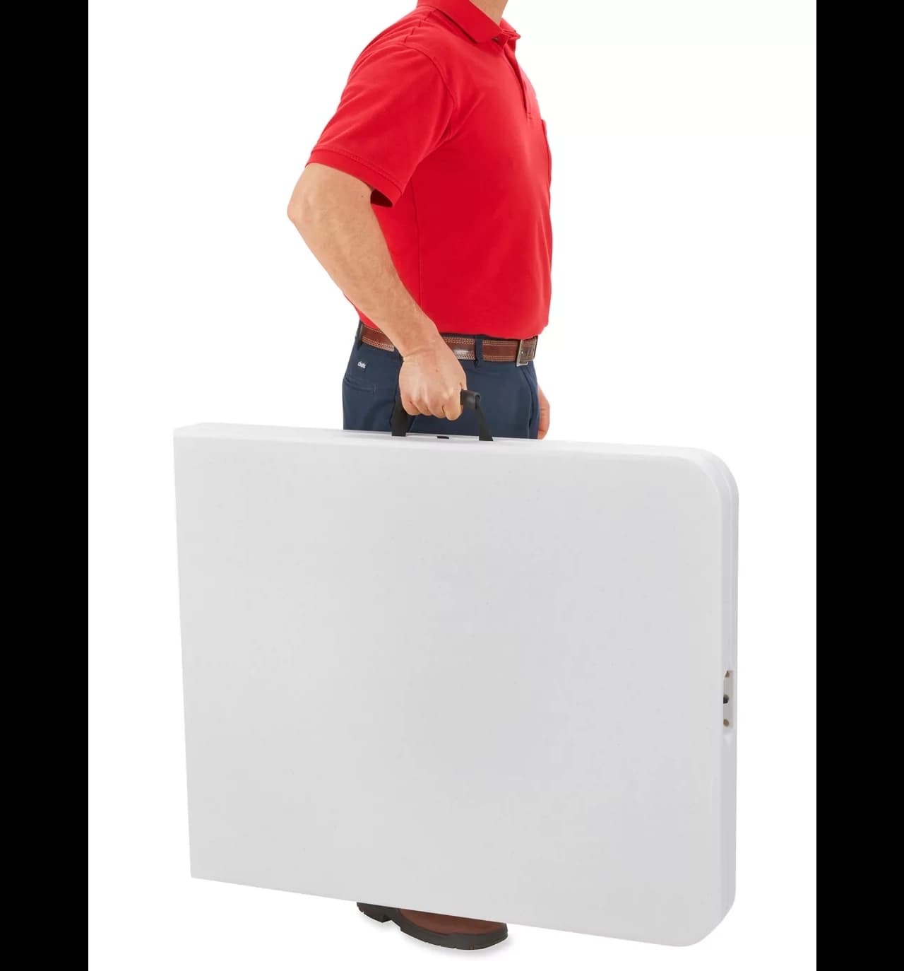 Folded 6-foot white plastic bi-fold table being carried by the built-in handle for transport.