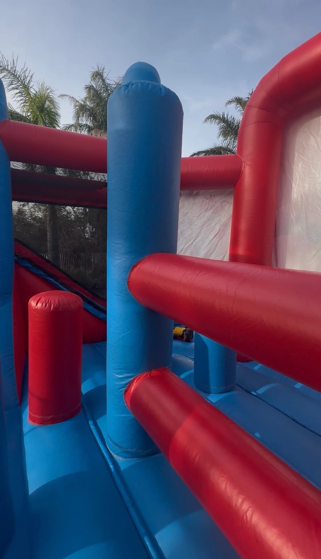 Close-up of obstacle elements inside the Disney Mickey Mouse 5-in-1 combo play area.