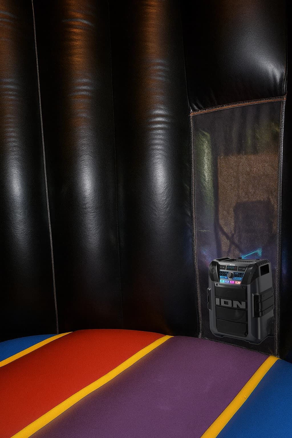 Interior angle of the Incredible Dance Party Dome Jumper showing built-in speakers and lighting effects.