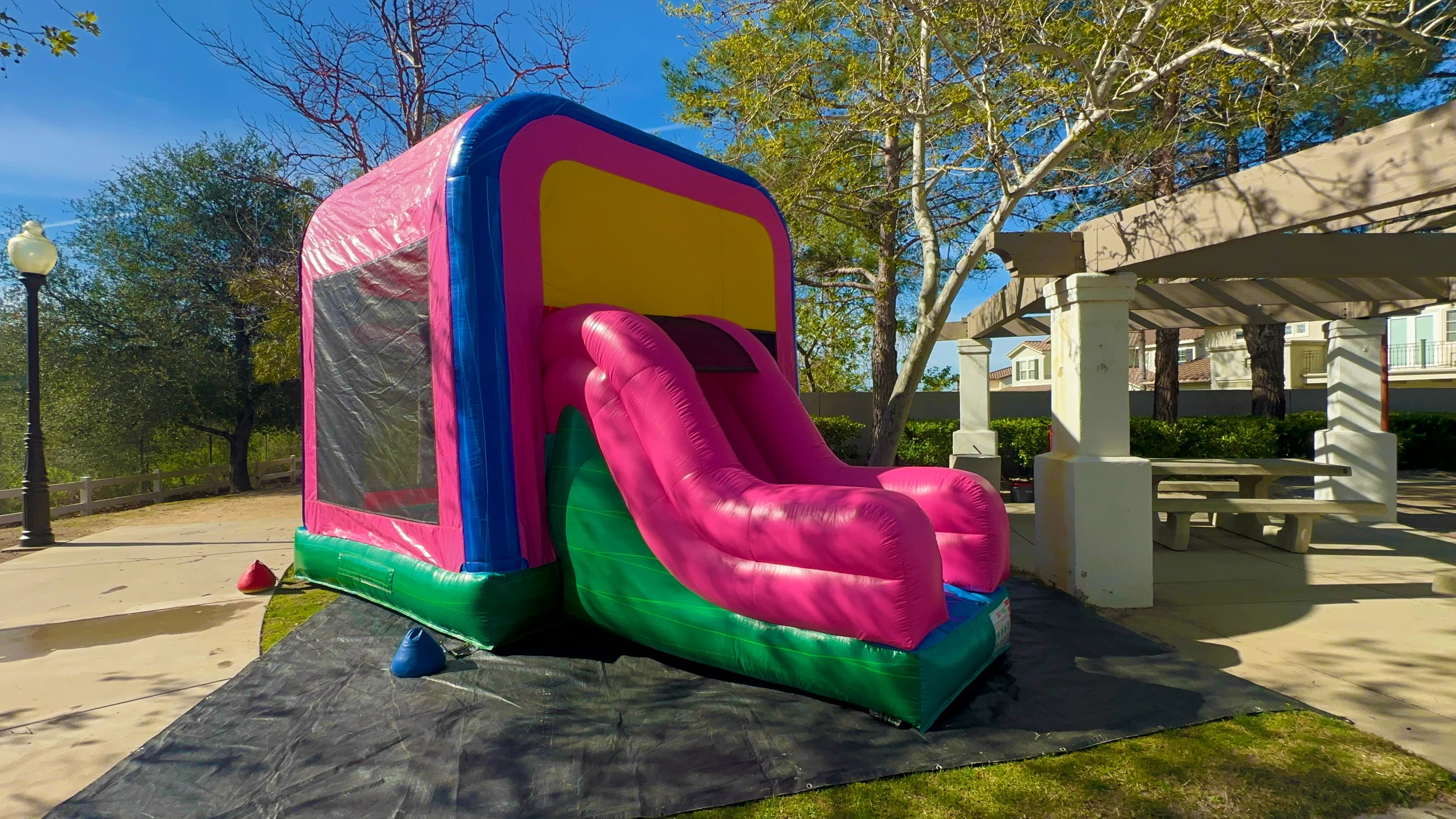 Side view of the Popular Pinko Combo Jumper highlighting slide structure, mesh panels, and Mickey ears topper.