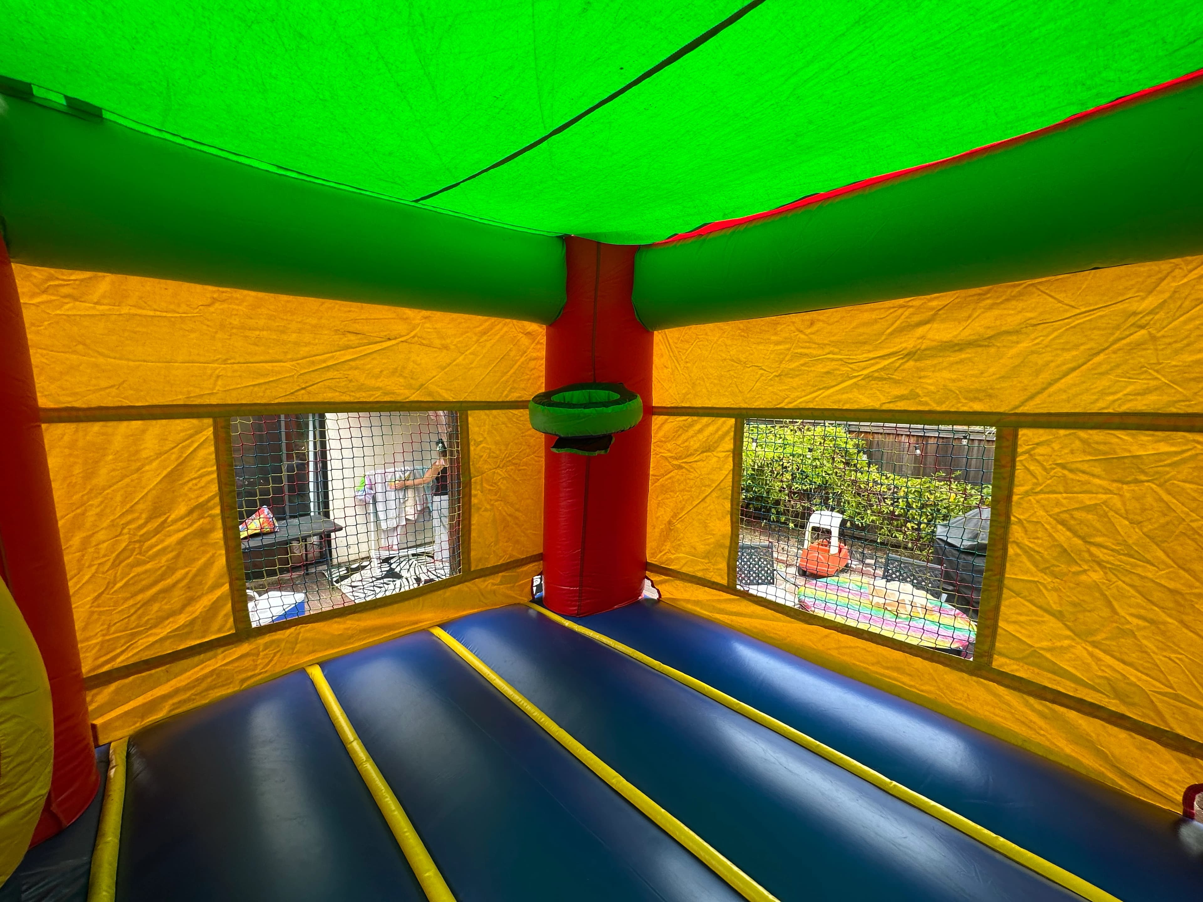 Detail of the Rainbow Castle Combo castle turret and rainbow arch decoration.