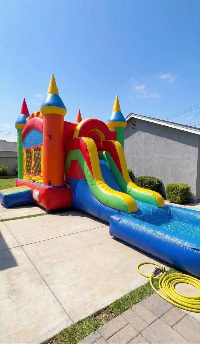 Front hero view of the Rainbow Splash Castle Combo showing main features and design.