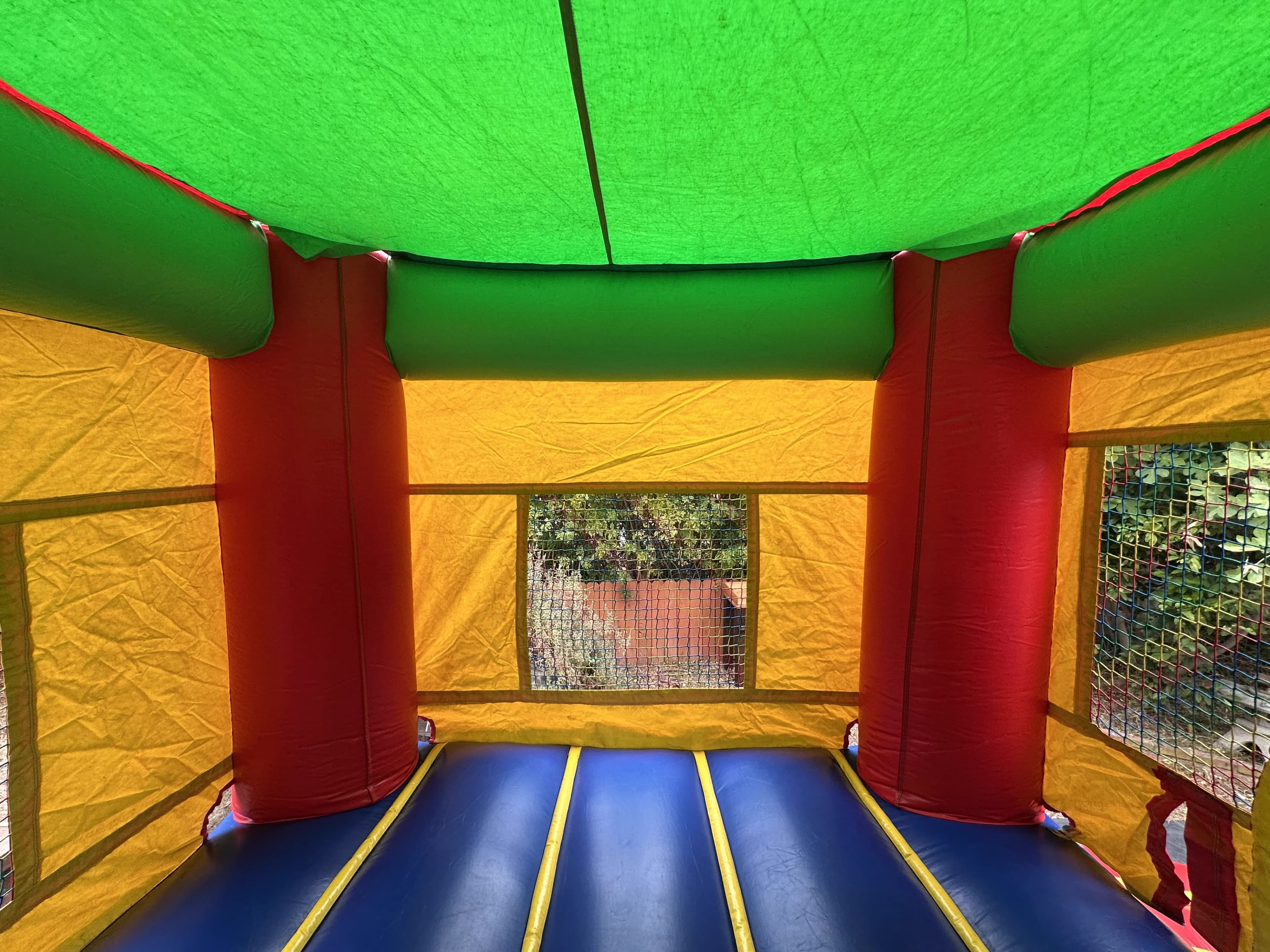 interior right angle view of the Rainbow Splash Castle Combo.