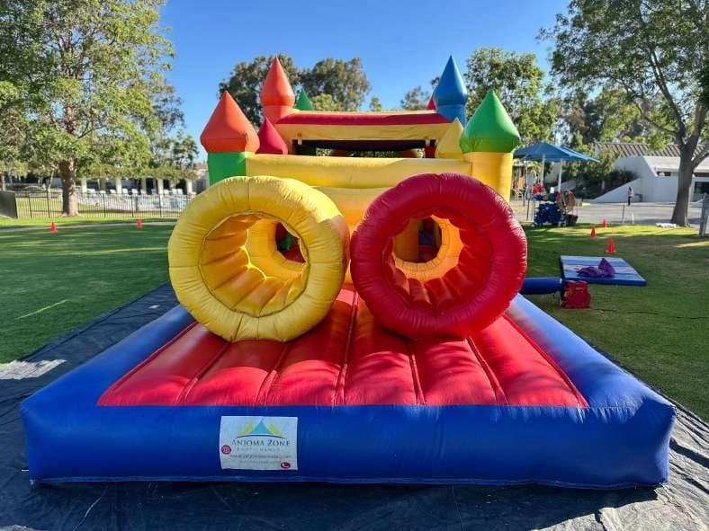 Outdoor front angle of the Super 6 in 2 Fun Run Obstacle Combo set up for an event.