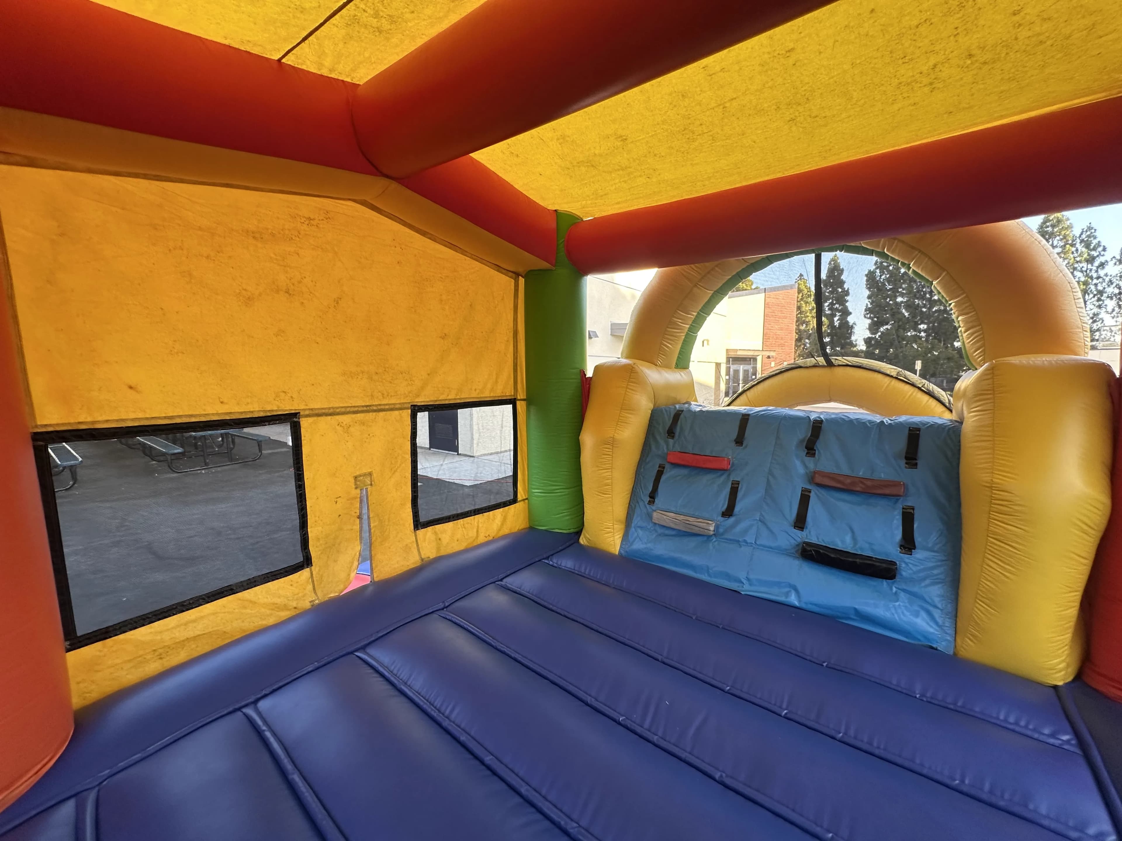 Interior room view of the Super 6 in 2 Fun Run Obstacle Combo showing the enclosed play compartment inside the course.