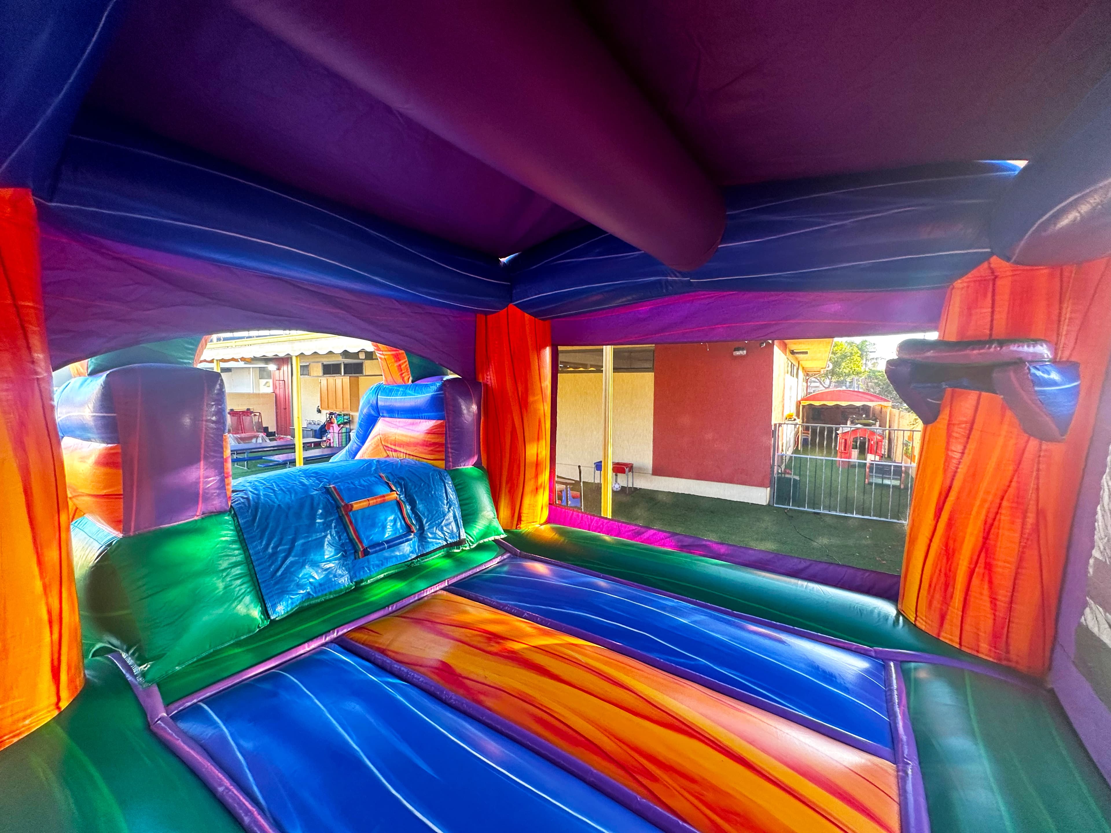 Interior view of the Warrior Titan 4-in-1 combo showing bounce space, side windows, and padded walls.